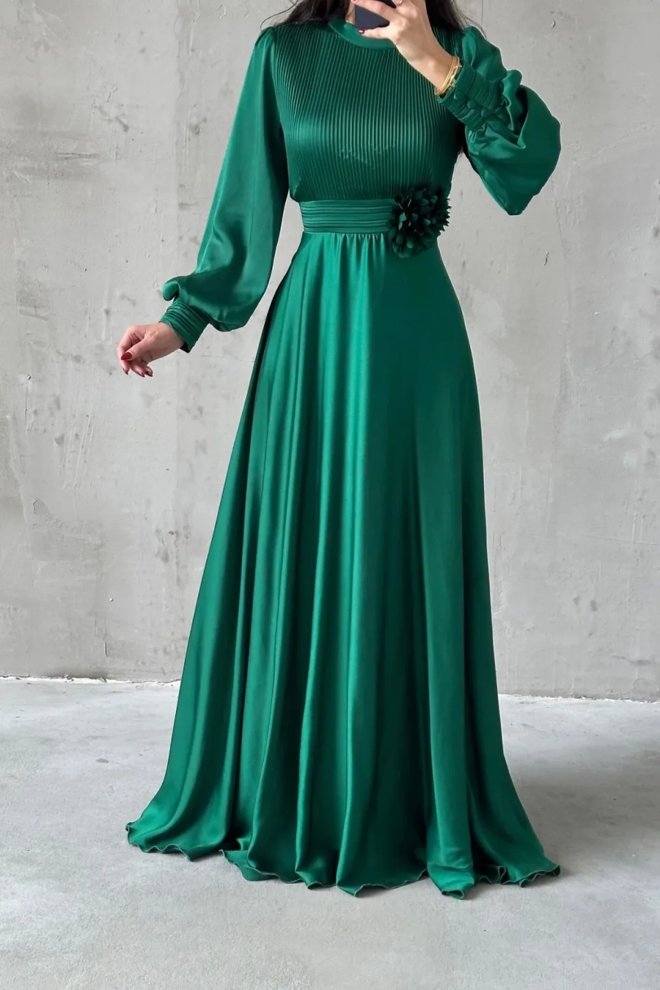Satin modest dress with puff sleeves and floral waist detail.