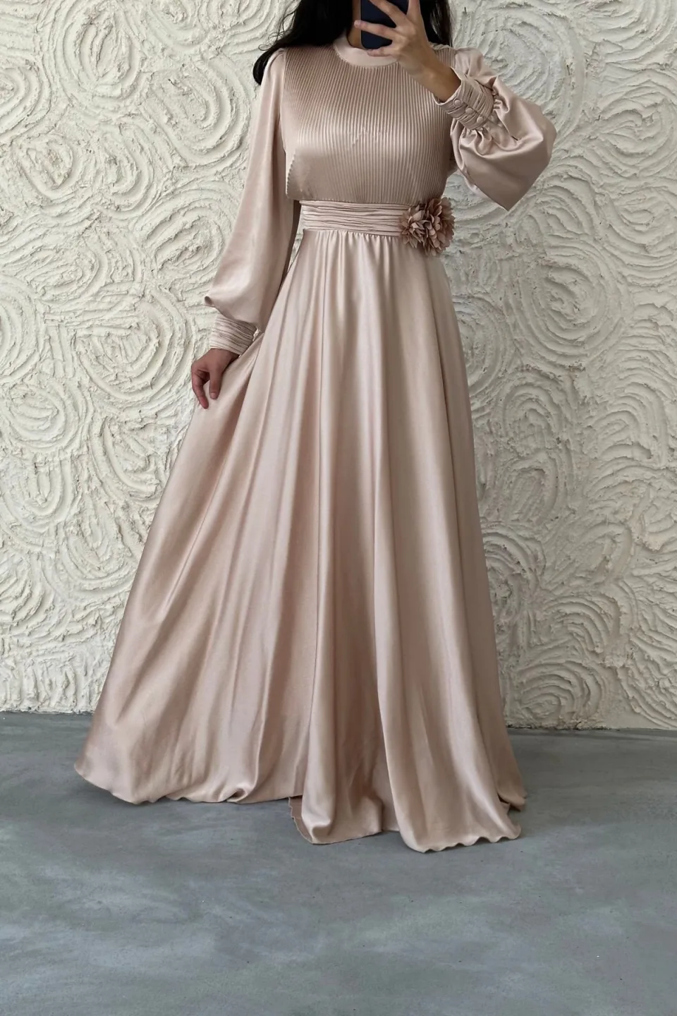 Satin modest dress with puff sleeves and floral waist detail.